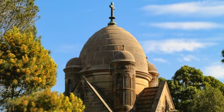 Iconic Frazer Mausoleum in Rookwood General Cemetery stands tall surrounded by lush greenery