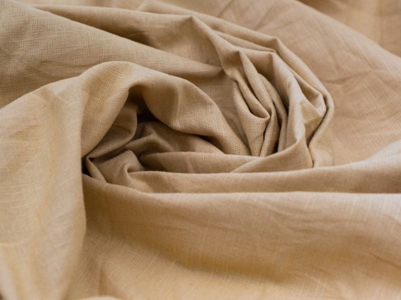 Close up of a cotton cloth, twisted in the shape of a swirl.