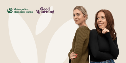 Two women stand back-to-back. A logo reading “Metropolitan Memorial Parks” and “Good Mourning” is on a beige background.