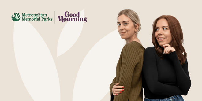 Two women stand back-to-back. A logo reading “Metropolitan Memorial Parks” and “Good Mourning” is on a beige background.